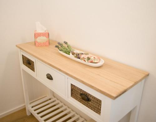 a table with a plate of food on top of it at kleines Landhaus Bodensee in Überlingen