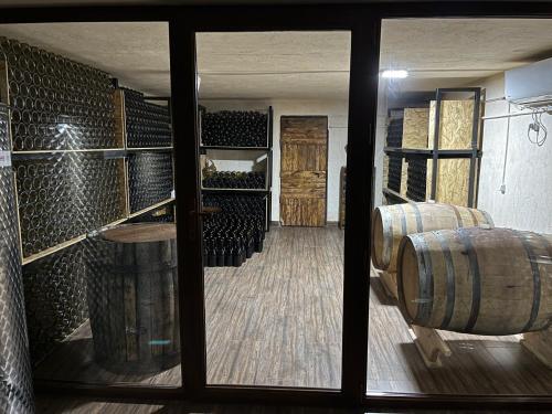 a view of a room with a wine cellar at Berkri Gastro Yard & Guest House in Yenokavan
