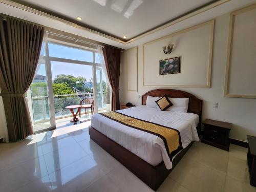 Cama o camas de una habitación en Marguerite Dalat Hotel