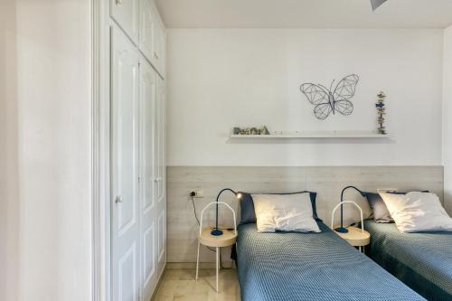 Posteľ alebo postele v izbe v ubytovaní Art- Apartamentos Revilla Tacke A