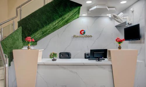 Μια τηλεόραση ή/και κέντρο ψυχαγωγίας στο Treebo Golden Inn, 700 Mtrs From Promenade Beach