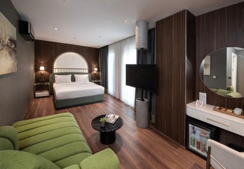 Postel nebo postele na pokoji v ubytování Hotel Bosfora