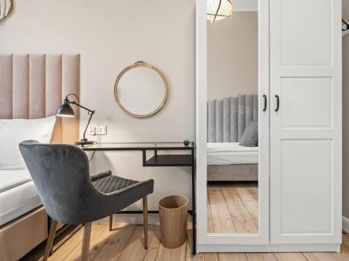 Postel nebo postele na pokoji v ubytování Boho Rooms Sopot