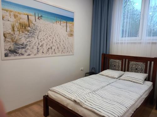 Postel nebo postele na pokoji v ubytování Pokoje przy Plaży Sopot
