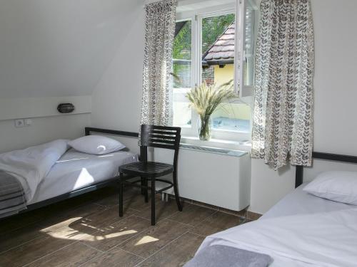 Postel nebo postele na pokoji v ubytování Varad INN