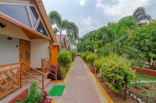 Jardín al aire libre en Natures Dreamland Holiday Homes, Igatpuri