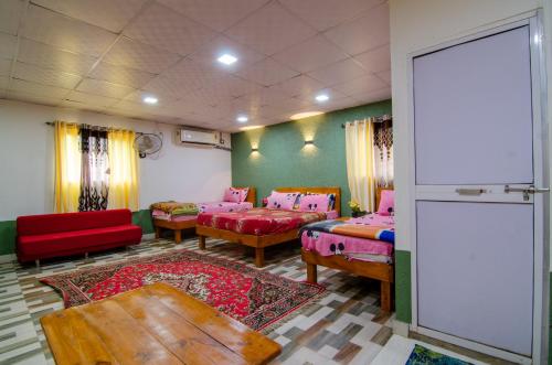 Zona de estar de Natures Dreamland Holiday Homes, Igatpuri