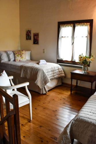 Postel nebo postele na pokoji v ubytování Selena Guest House