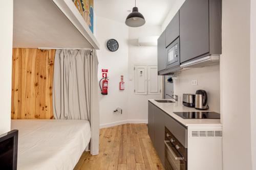 Kuchyň nebo kuchyňský kout v ubytování ALTIDO Homey flat