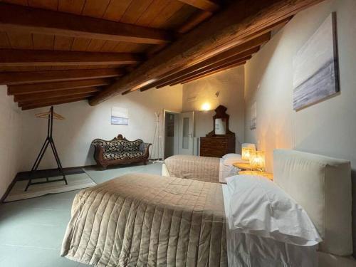 a bedroom with two beds in a room at Appartamento Stadio in Cremona