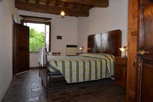 A bed or beds in a room at Villa Pascolo