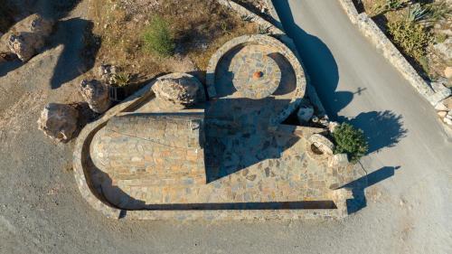 an overhead view of a stone structure on the side of a road at Elafonisi Village in Elafonisi