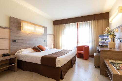 Postel nebo postele na pokoji v ubytování NilHotel Florence