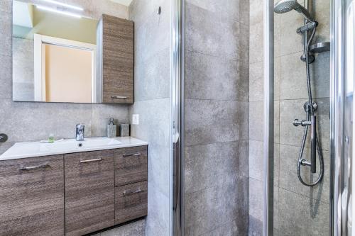 Ванна кімната в Mora Apartment