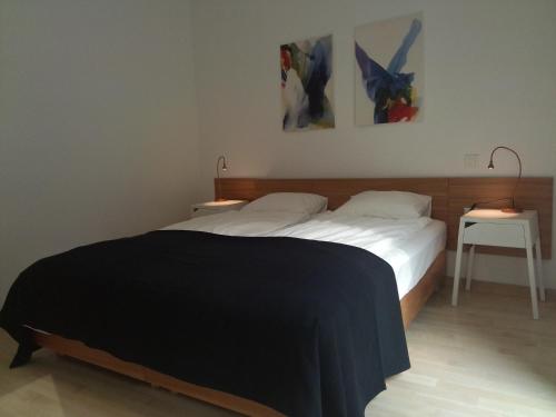 Ένα ή περισσότερα κρεβάτια σε δωμάτιο στο Drance Apartments