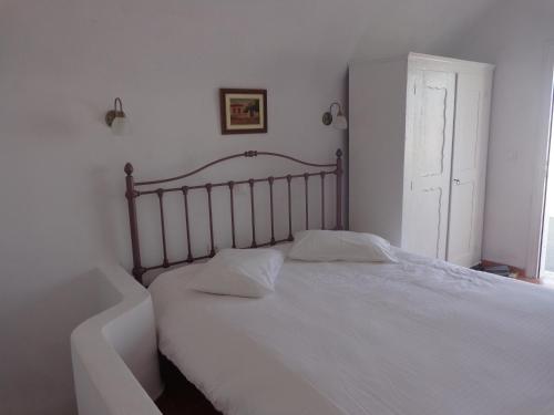 Ένα ή περισσότερα κρεβάτια σε δωμάτιο στο Langas Villas