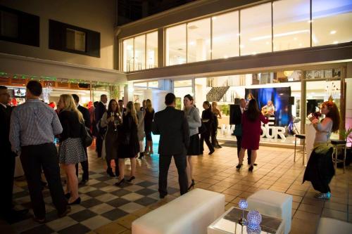 a group of people standing in a store lobby at Hope Harbour Hotel in Gold Coast