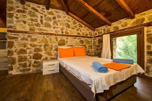 Postel nebo postele na pokoji v ubytování Petrini Spiti
