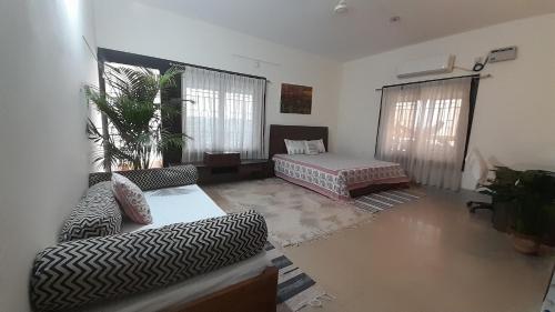 Postel nebo postele na pokoji v ubytování Sublime Homestay