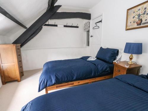 Ένα ή περισσότερα κρεβάτια σε δωμάτιο στο Lime Cottage