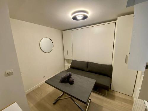 Posezení v ubytování Petit appartement en duplex - mignon et cosy