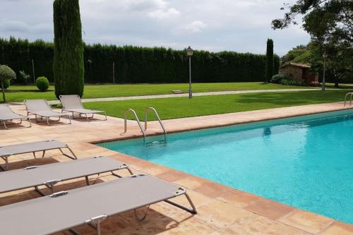 The swimming pool at or close to Villa privada de lujo Can Riera