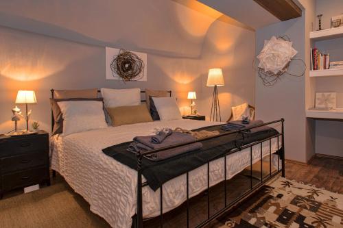 Säng eller sängar i ett rum på Heraclea Residential Apartments