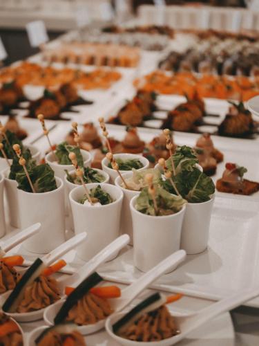 a buffet of food on a table with chopsticks at Hotel Fariones in Puerto del Carmen