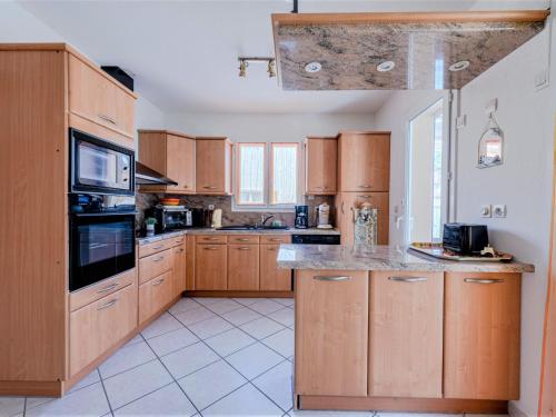 Kuchyň nebo kuchyňský kout v ubytování Villa Ladine by Interhome