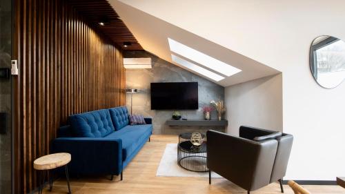 TV a/nebo společenská místnost v ubytování Apartament Kalinowa 13 - Gwiazda Szczyrku & Sauna
