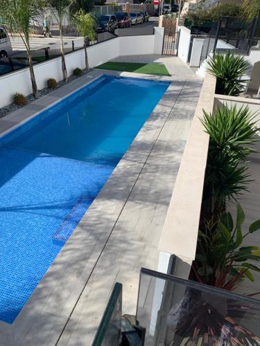 Πισίνα στο ή κοντά στο SUNtiago Apartment Residential Elisa