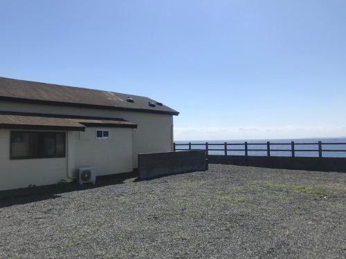 a house with a view of the ocean at Villa Thalassa 貸切 in Oshima