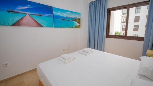 Postel nebo postele na pokoji v ubytování Marina Duquesa 516