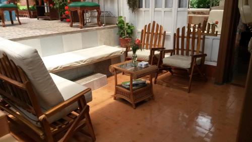 Posezení v ubytování Hostal el Parque Tababela