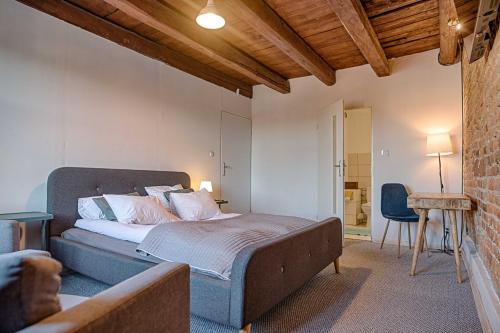 Postel nebo postele na pokoji v ubytování 3 Bros' Hostel Cieszyn