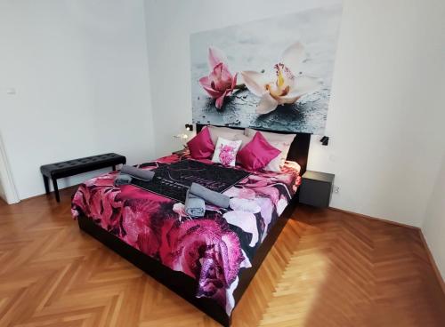 A bed or beds in a room at Orchidea Apartment Split in the Centre