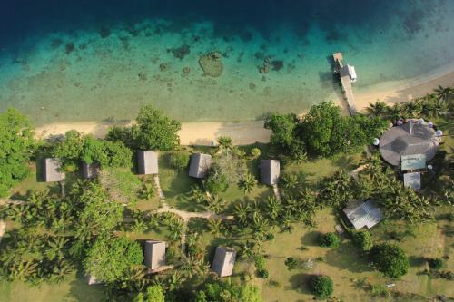 an aerial view of a resort near the ocean at Aore Island Resort in Luganville