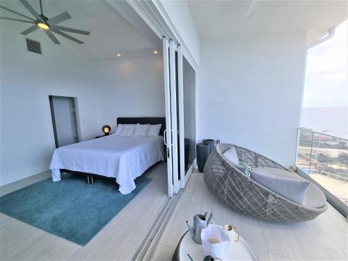 Ένα ή περισσότερα κρεβάτια σε δωμάτιο στο Lighthouse Point Residences