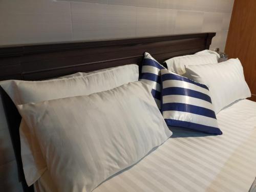 Ένα ή περισσότερα κρεβάτια σε δωμάτιο στο Shagufta Hotel Murree