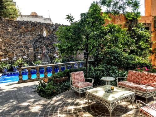 Taman di luar Casa Schuck Boutique Hotel