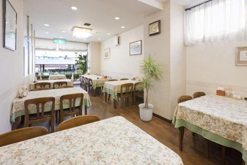 Reštaurácia alebo iné gastronomické zariadenie v ubytovaní Onomichi Daiichi Hotel