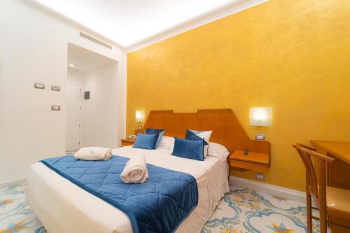 Postel nebo postele na pokoji v ubytování Hotel San Pietro
