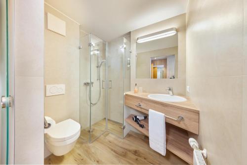 Ванная комната в Hotel Garni Gästehaus am Mühlbach