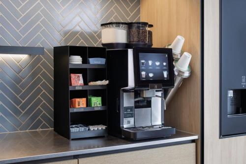 a coffee machine on a counter in a room at Fairfield by Marriott Hyogo Tajima Yabu in Yabu