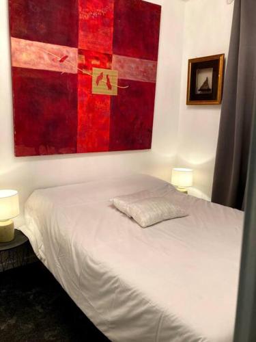Postel nebo postele na pokoji v ubytování Appartement à Sommières