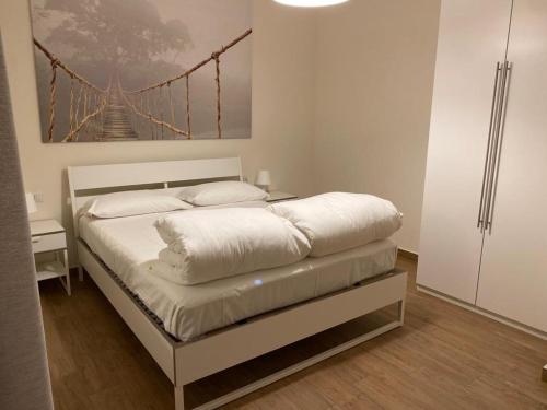 Posteľ alebo postele v izbe v ubytovaní Casa Rosy