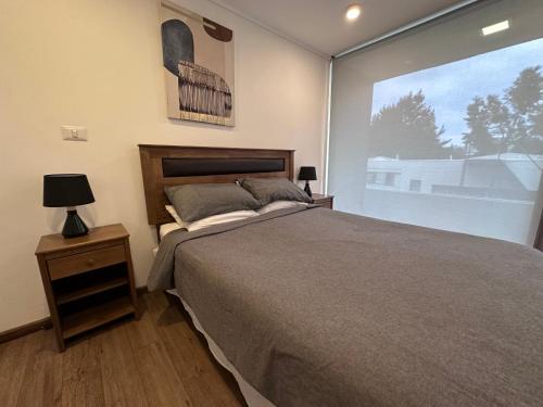 Ένα ή περισσότερα κρεβάτια σε δωμάτιο στο Apart Hotel Castellon 176