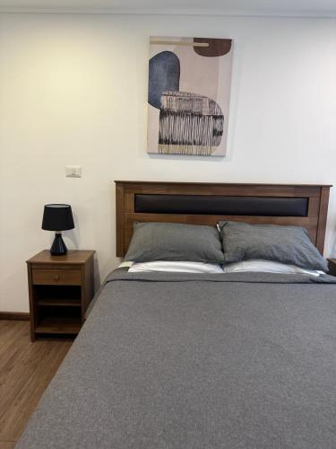 Ένα ή περισσότερα κρεβάτια σε δωμάτιο στο Apart Hotel Castellon 176