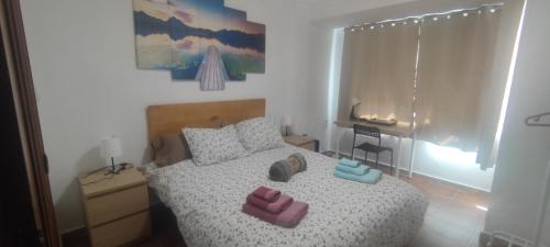 Katil atau katil-katil dalam bilik di Albalat Apartment