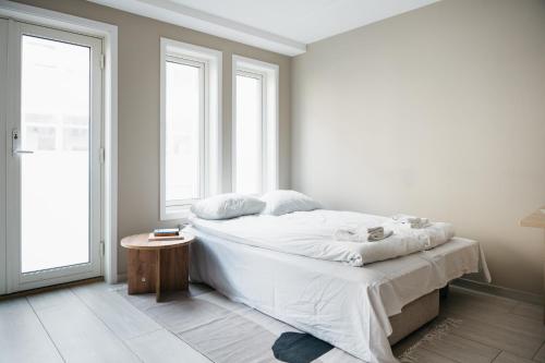 Postel nebo postele na pokoji v ubytování Stay Urban - Scandinavian Comfort with French Balcony
